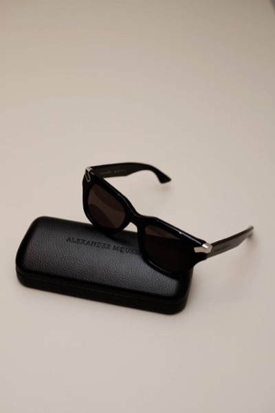Black sunglasses with logo